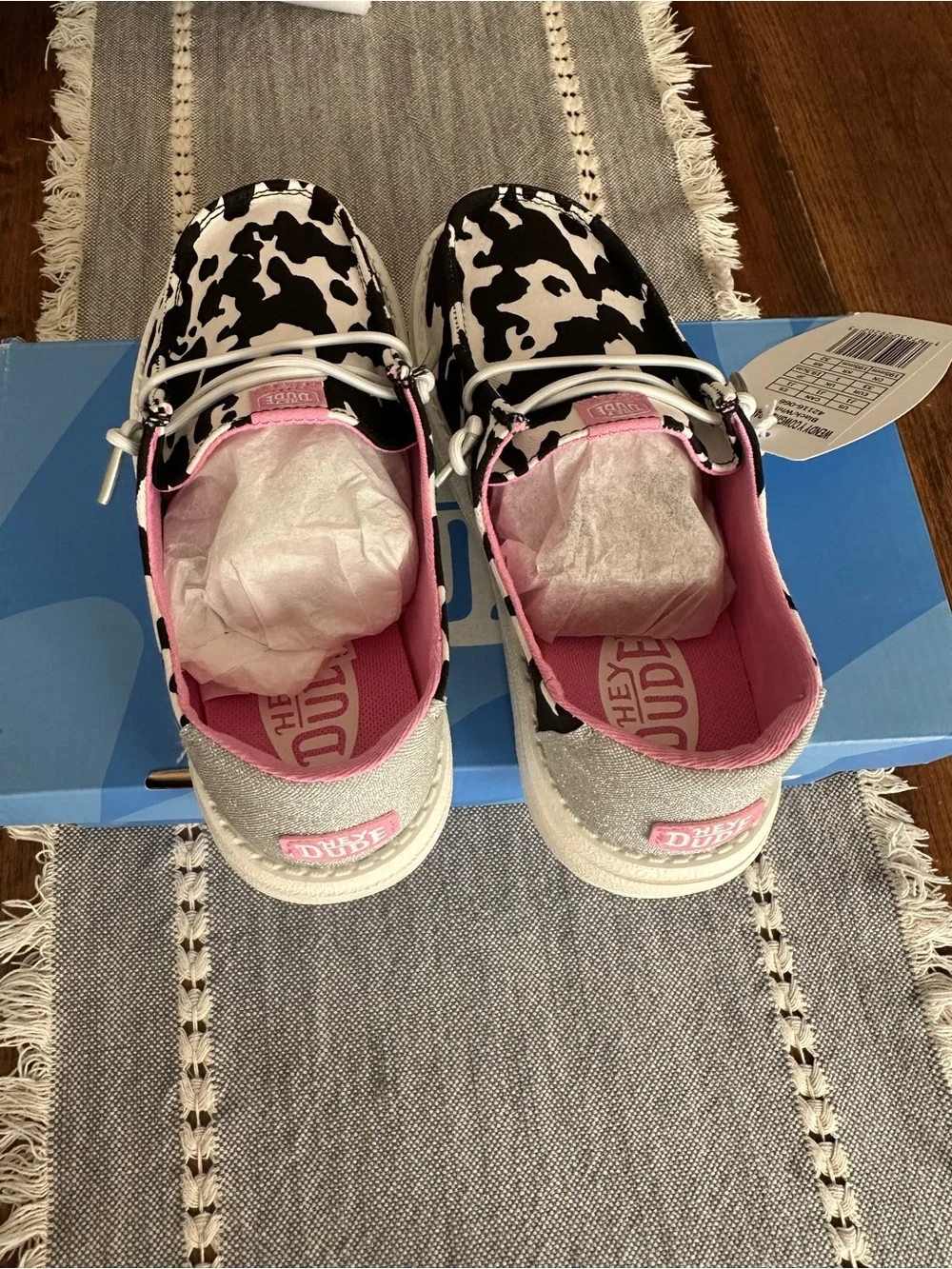 Kids' Cow Print Slip-On Shoe in Black & White with Pink Lining